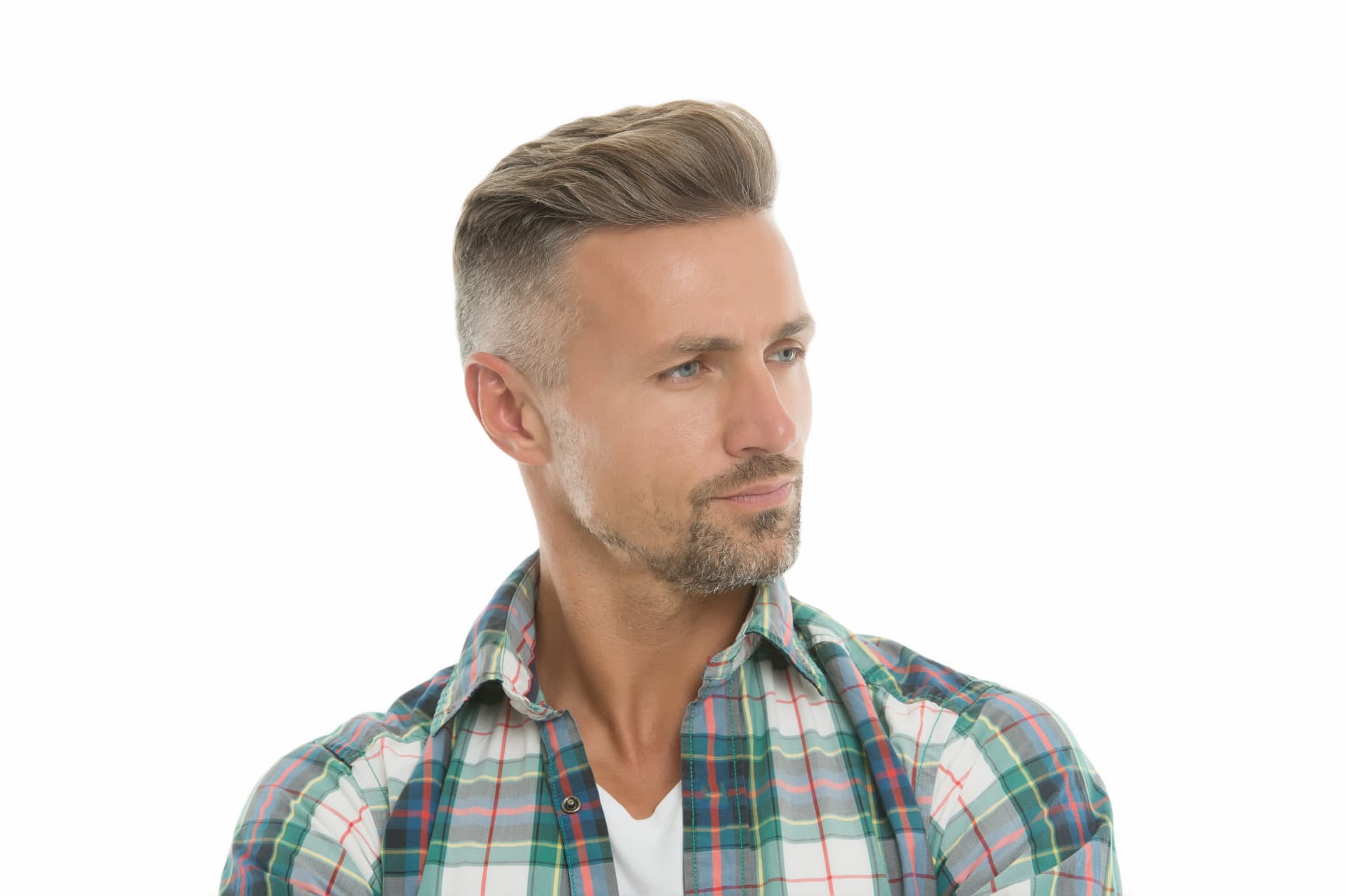 Man with a natural, full head of hair after wearing a Halo Studio hair system